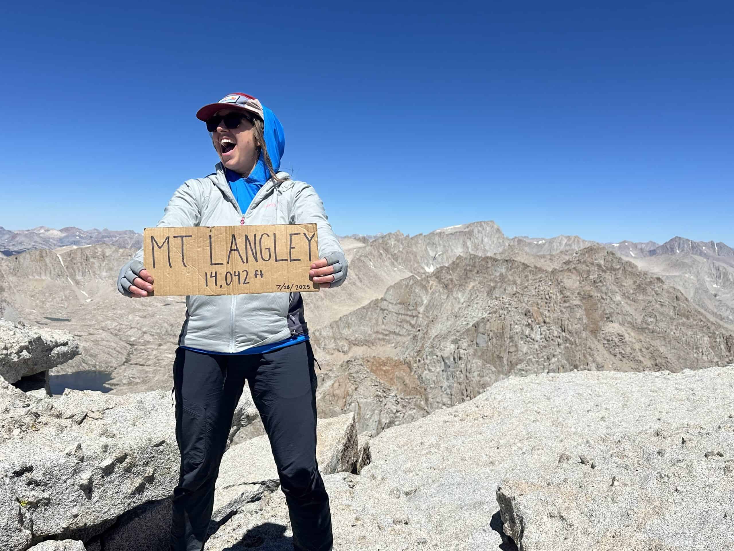 Hiker on the summit of Mt. Langley